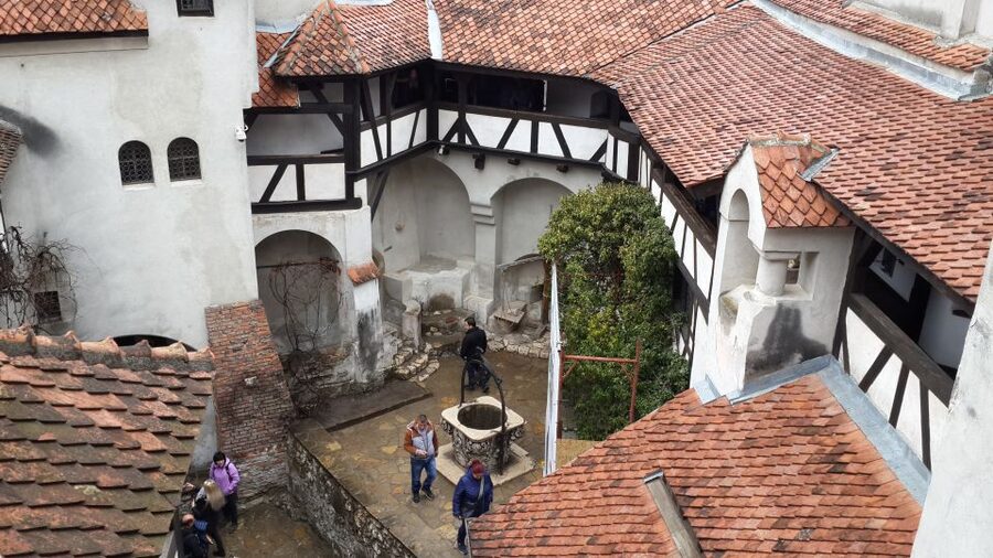 Brasov: Peles Castle, Bran Castle & Rasnov Fortress Day Tour - Sinaia Monastery brings a quieter pause