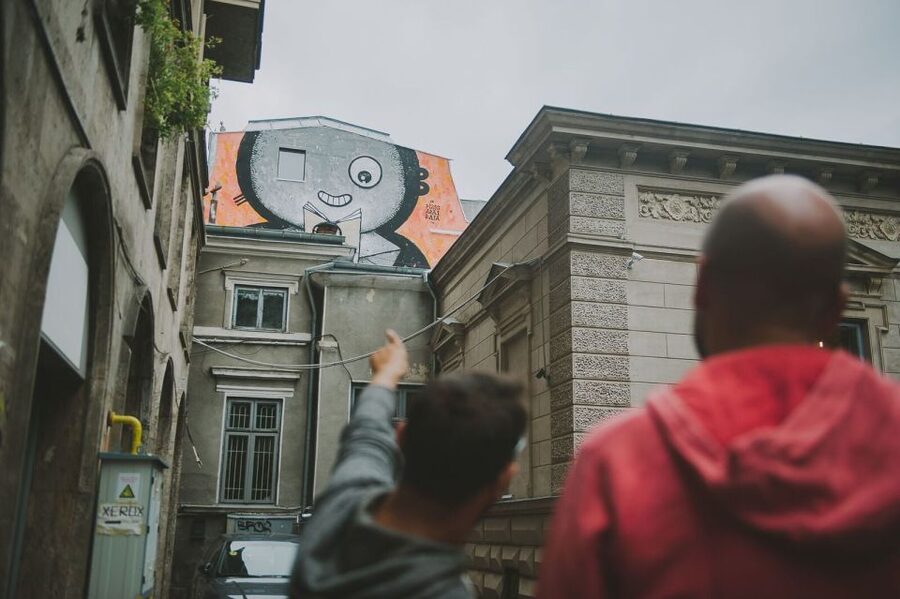 Bucharest Alternative Walking Tour - Along the boulevard toward Revolution Square