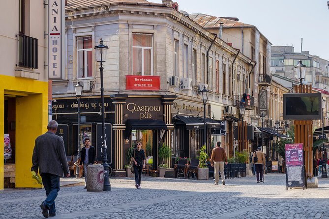Bucharest Essential Tour: Old Town, Calea Victoriei & Communism - Revolution Square and the cost of communist rule