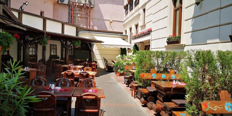 Bucharest: Street Food Tour with a Local Guide - Riding the tram through Bucharest’s older quarters