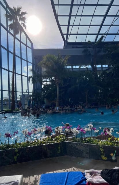 Bucharest: Therme Night Show Ticket with Transfer - A tropical garden beside the pools