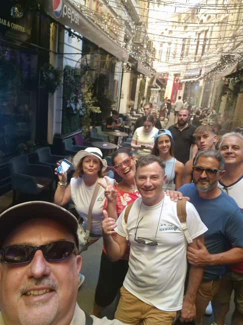 Bucharest: Walking tour with Italian speaking guide for small groups - Starting beside Caru’ cu Bere in Old Town