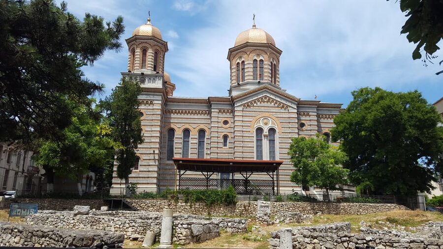 From Bucharest: A Day by the Black Sea Shared Group Tour - Churches, the mosque, and Ovidiu Market