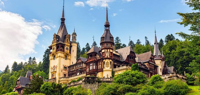 One Day Private Tour to Peles and Dracula Castles & Brasov City - Peles Castle and the royal setting in Sinaia