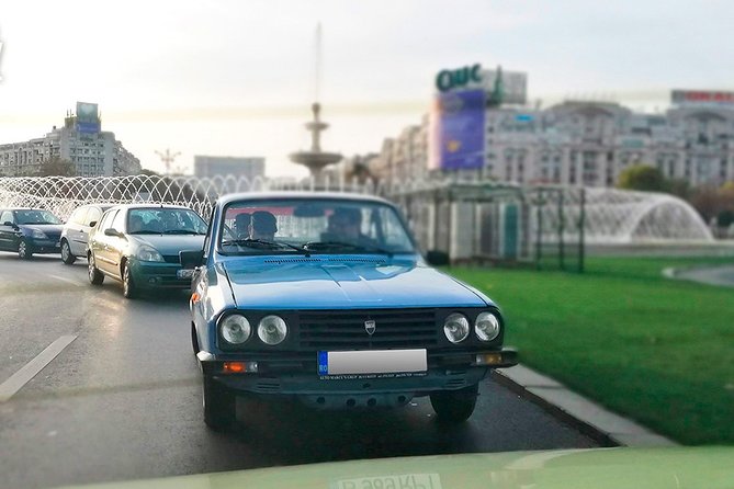 Private -RedPatrol Tour of Bucharest with a Romanian Vintage Car - Apartment blocks, government quarters, and older Bucharest