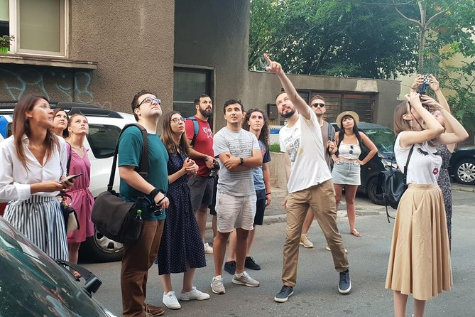 Private Walking Tour: Essential Bucharest + Hidden Gems - Revolution Square and the visible scars of power