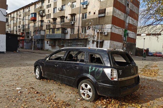 Troubled - Notorious Neighborhood - area known for social issues - Why a private vehicle changes the experience